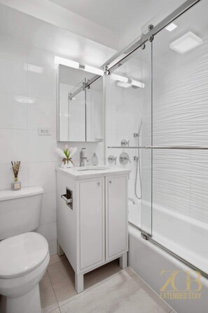 Shower, hair dryer, towels - Gorgeous 2-Bedroom Retreat in the Upper East Side! (New York)