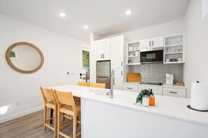 Fridge, microwave, stovetop, dishwasher - Queen Bunk Cottage | Sleeps 6 | Pool + River (New Braunfels)