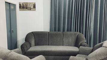 Desk, laptop workspace, iron/ironing board