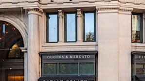 A building with a storefront named "Cucina & Mercato" and "Eataly Gelato". - Sun-Filled Brownstone Apt in Prime Chelsea (New York)