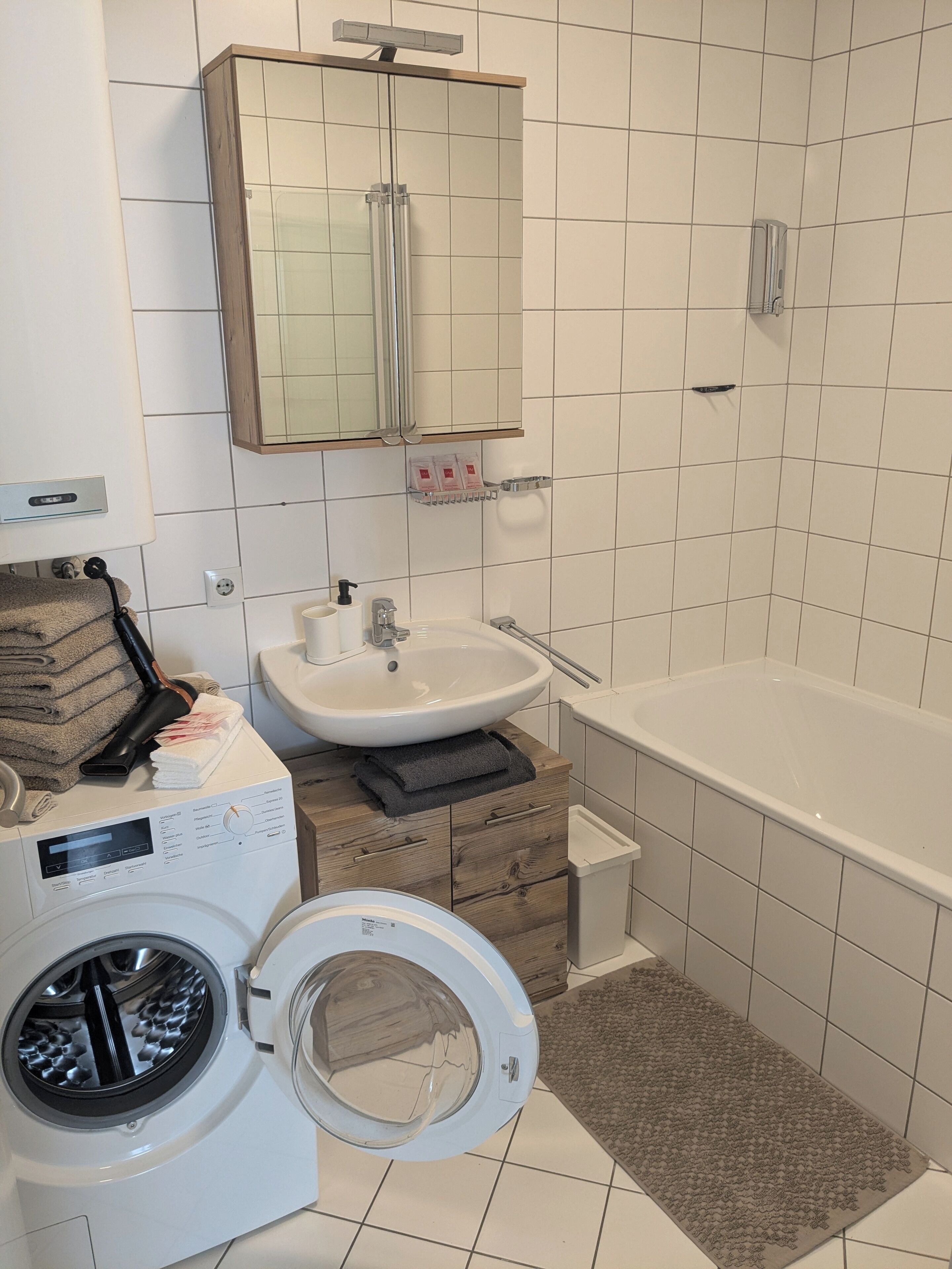 Hair dryer, towels, toilet paper