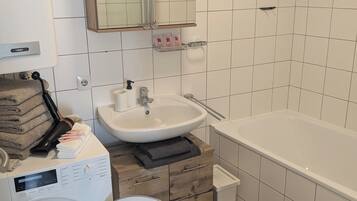 Hair dryer, towels, toilet paper