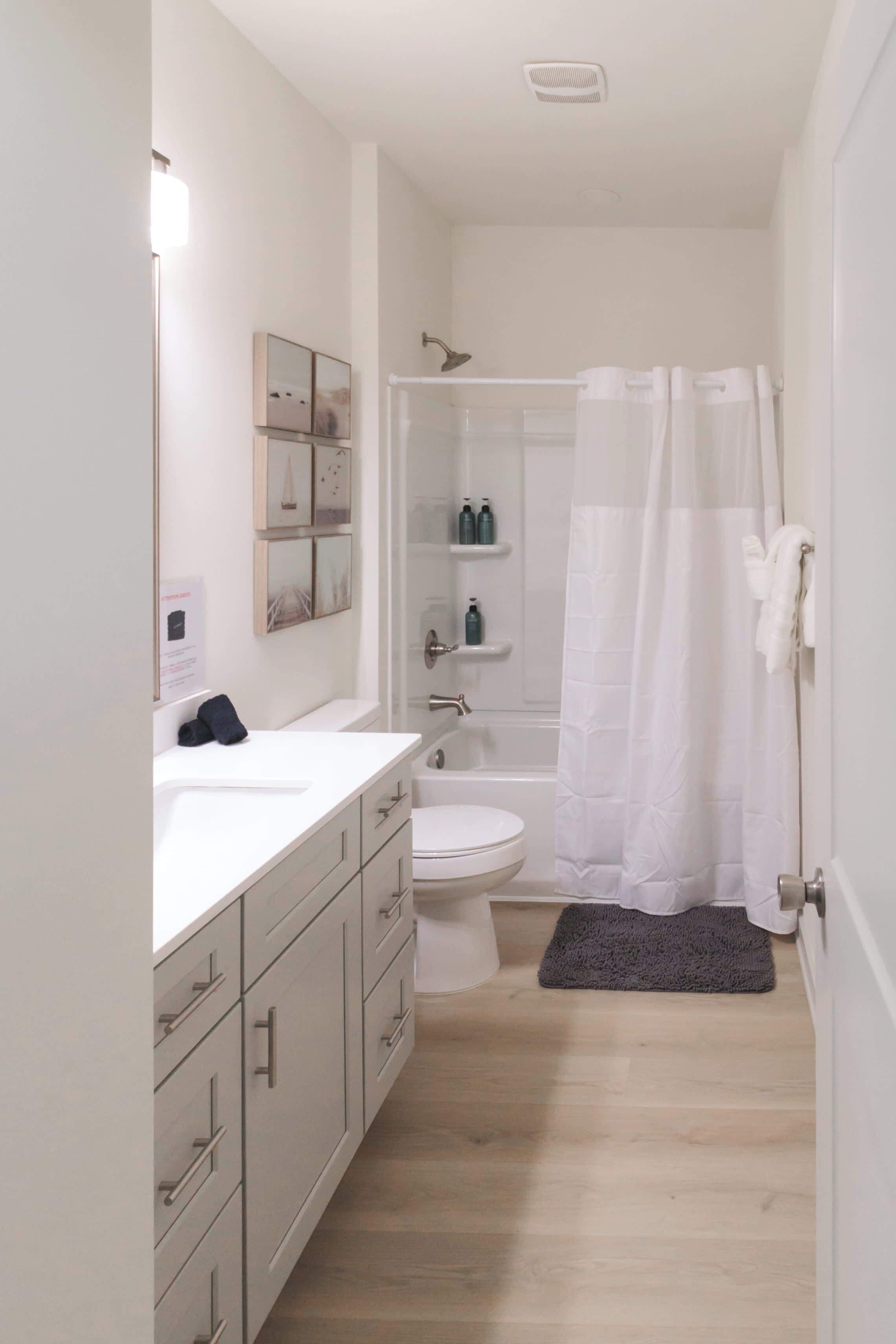 Shower, hair dryer, towels, shampoo