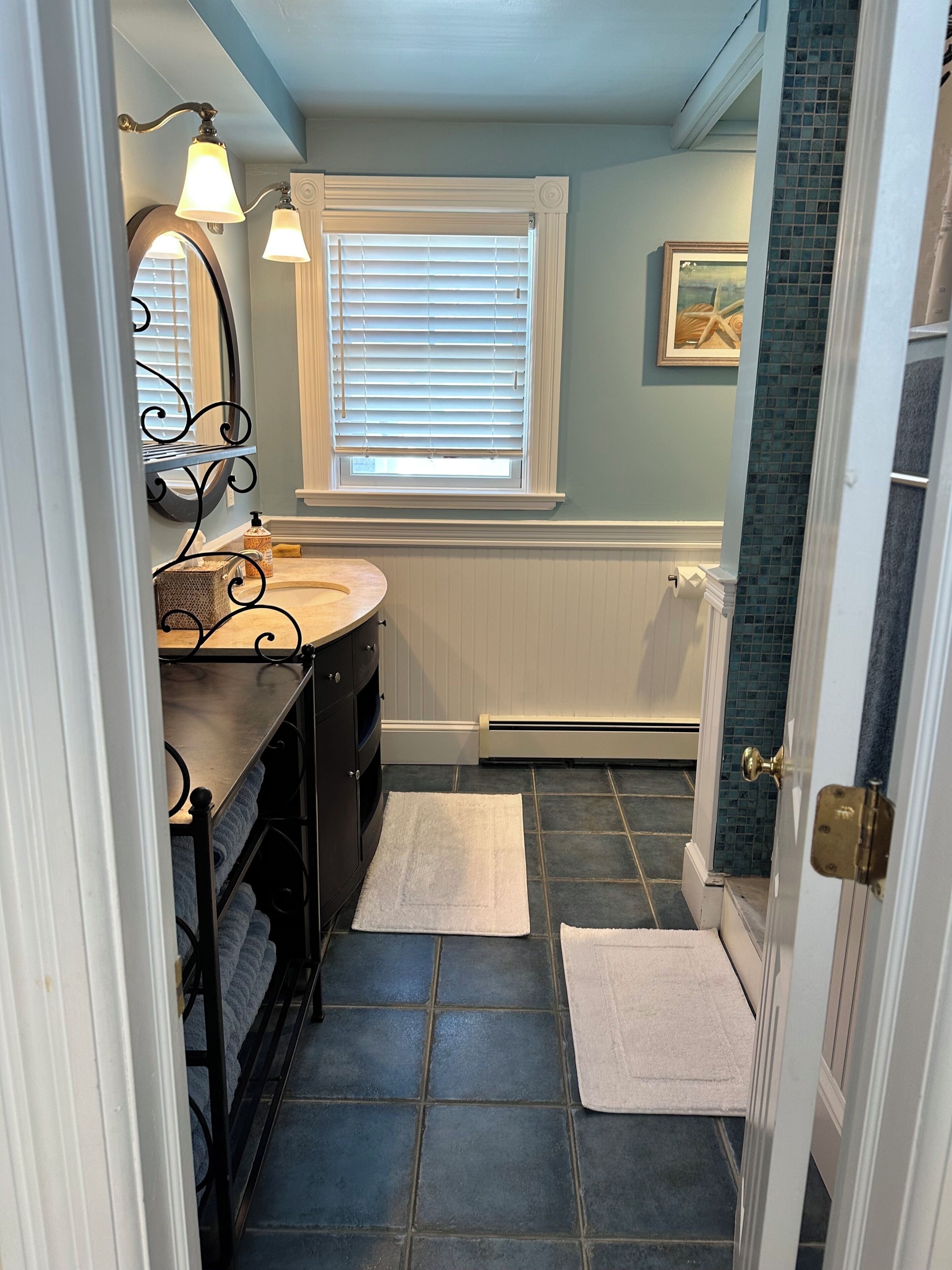 Shower, towels, toilet paper