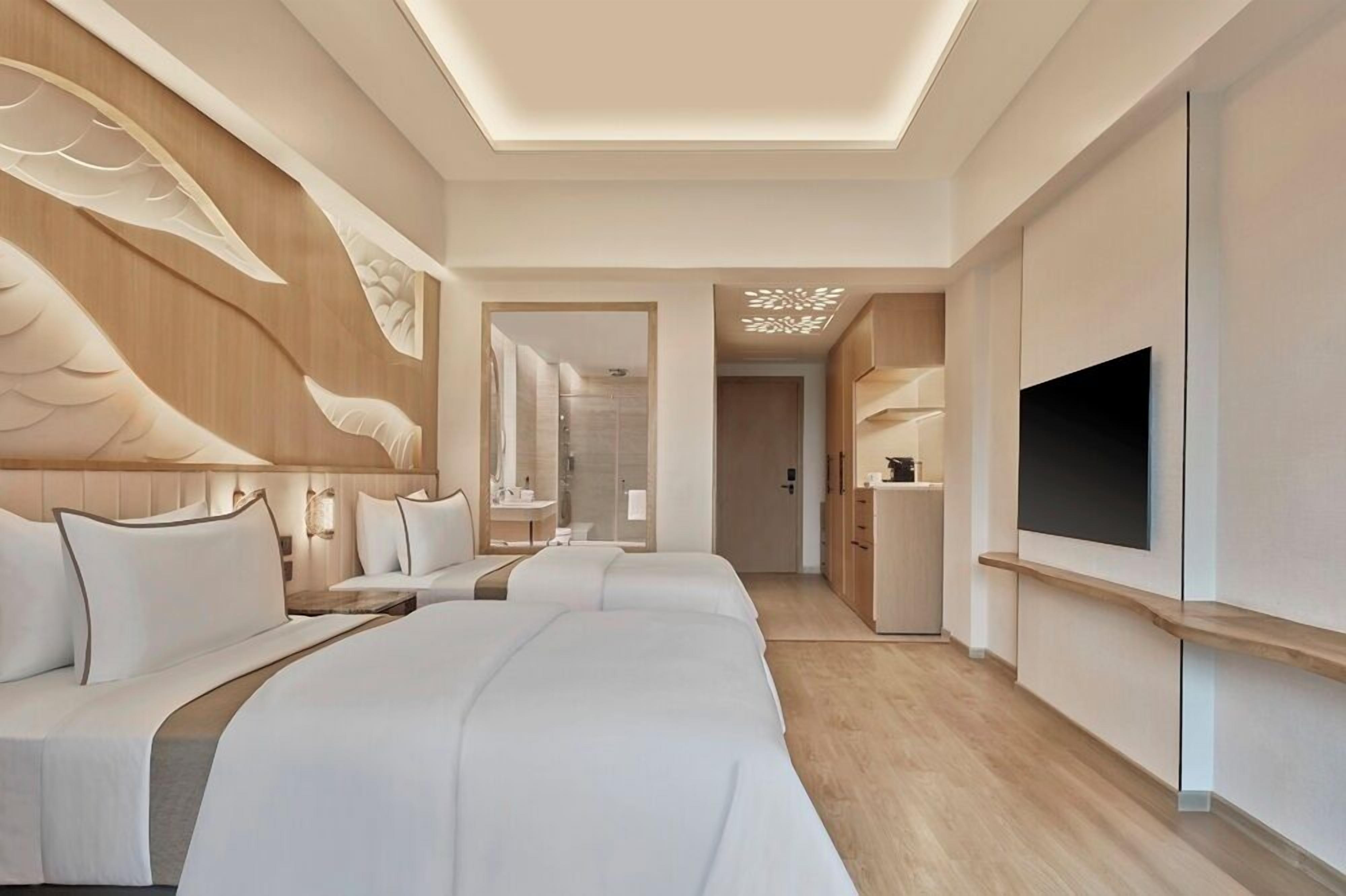 Quarto luxo, 2 camas de solteiro, sacada, vista para o resort