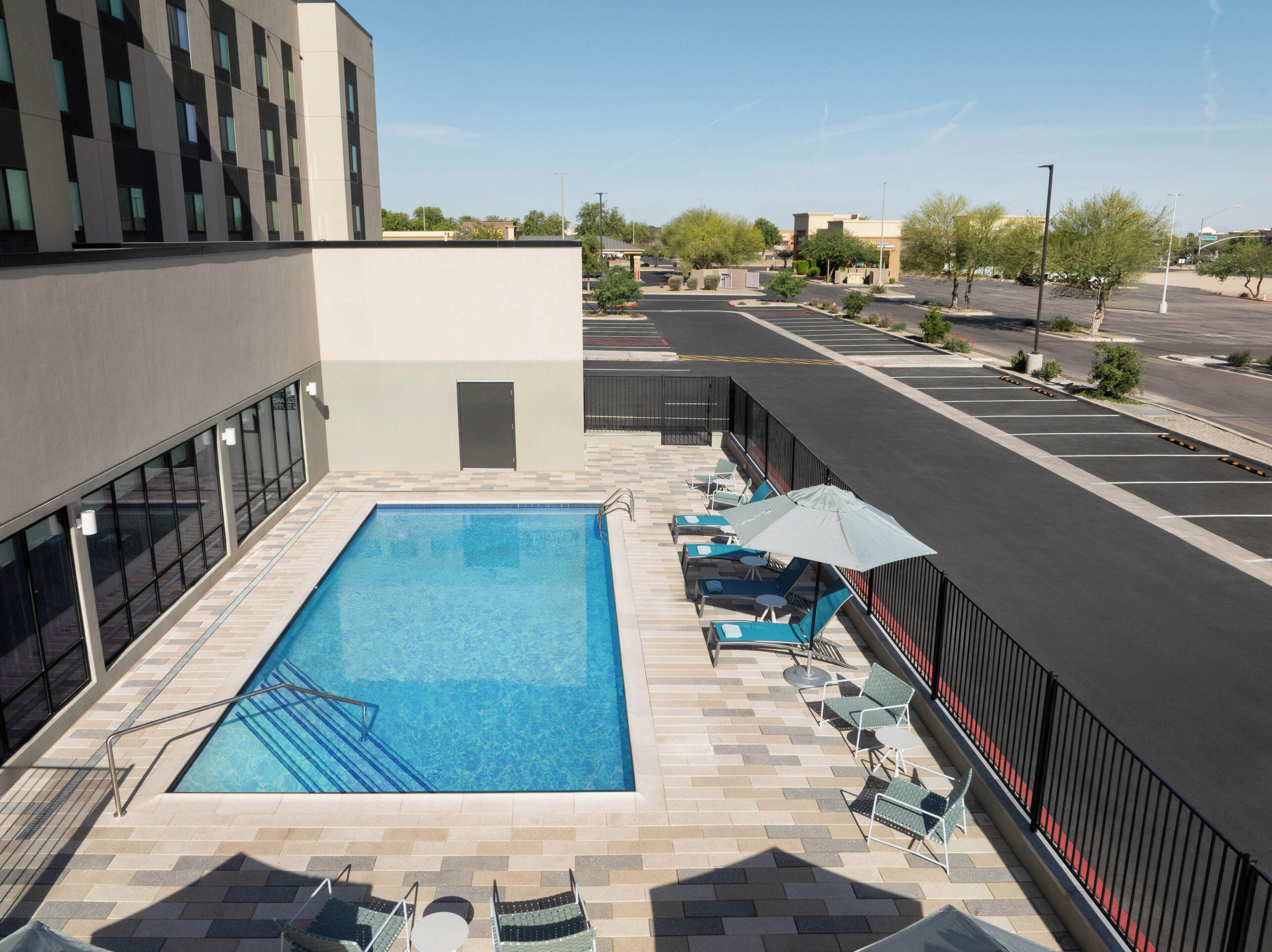 Outdoor pool, pool umbrellas, sun loungers