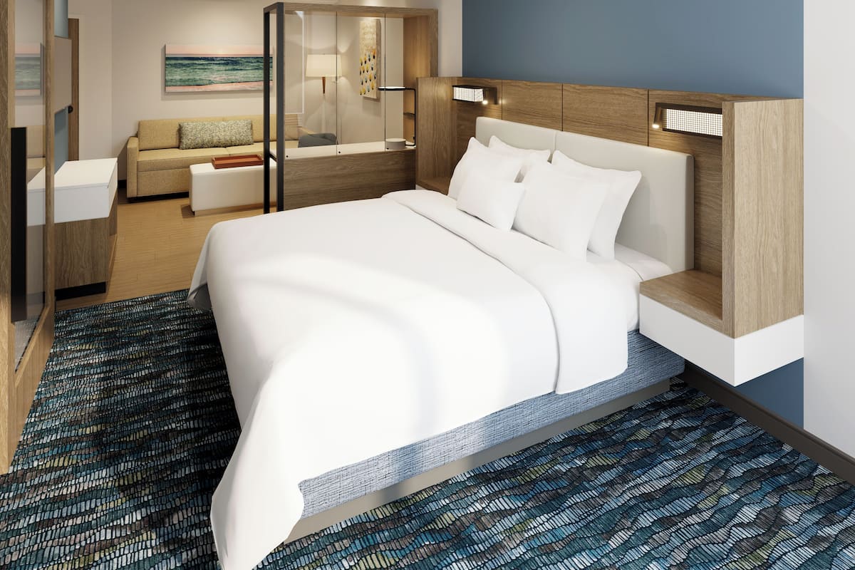 Hypoallergeen beddengoed, een bureau, een laptopwerkplek