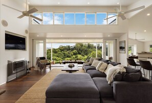 TV, fireplace, DVD player, books - Byrons Brae – Tranquil Estate w/ Pool & Views (Possum Creek)