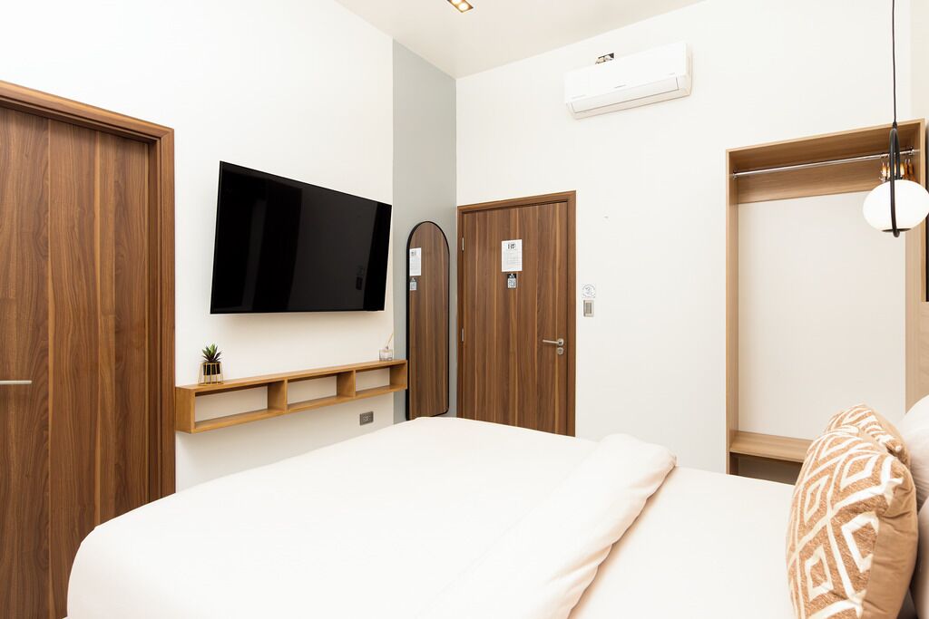 Habitación Confort, vista a la ciudad | Wifi gratis y ropa de cama 