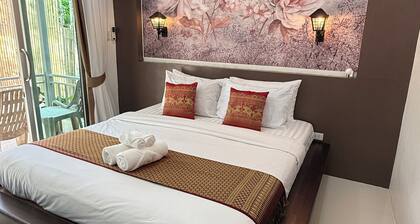 Lovely 1-bedroom private bungalows at riverside resort with AC and full kitchen.