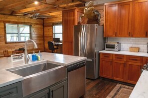Private kitchen - Burnt Pine Ranch - Springs Retreat. 100 year old secluded rustic farm cabin. (Branford)