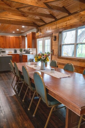 Dining - Burnt Pine Ranch - Springs Retreat. 100 year old secluded rustic farm cabin. (Branford)