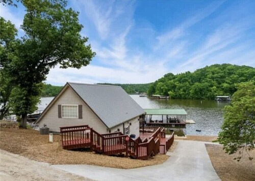 Marvelous 3-bedroom home steps to the water of a nice quiet calm cove.