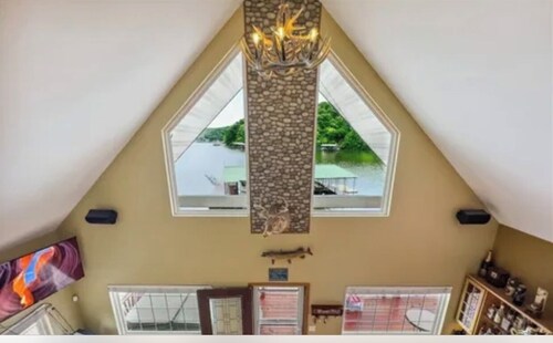 Marvelous 3-bedroom home steps to the water of a nice quiet calm cove.