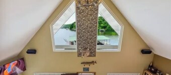 Marvelous 3-bedroom home steps to the water of a nice quiet calm cove.