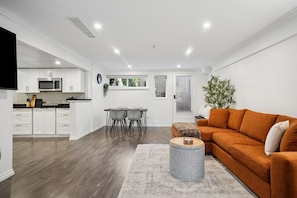 Living area - Bright, New & Spacious 1 Bedroom Suite! Family friendly & central to shopping. (Burnaby)