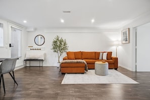 Living area - Bright, New & Spacious 1 Bedroom Suite! Family friendly & central to shopping. (Burnaby)