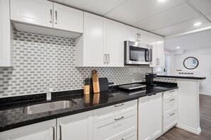 Private kitchen - Bright, New & Spacious 1 Bedroom Suite! Family friendly & central to shopping. (Burnaby)