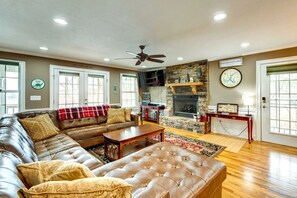 TV, fireplace, books - Lakefront Escape | Dock, Fire Pit & Game Room (Sparta)
