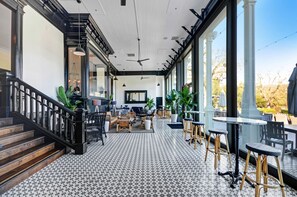 Kick back in this beautiful, light-filled Mansion Terrace Lounge. It’s the perfect spot to unwind cocktail and small bites after a day exploring the valley. - Napa Studio Retreat at Silverado Resort (Napa)
