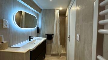 Hair dryer, towels, soap, toilet paper