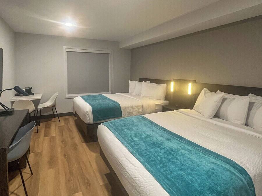 Standardzimmer, 2 Queen-Betten, Nichtraucher, Küche | Kostenloses WLAN, Bettwäsche