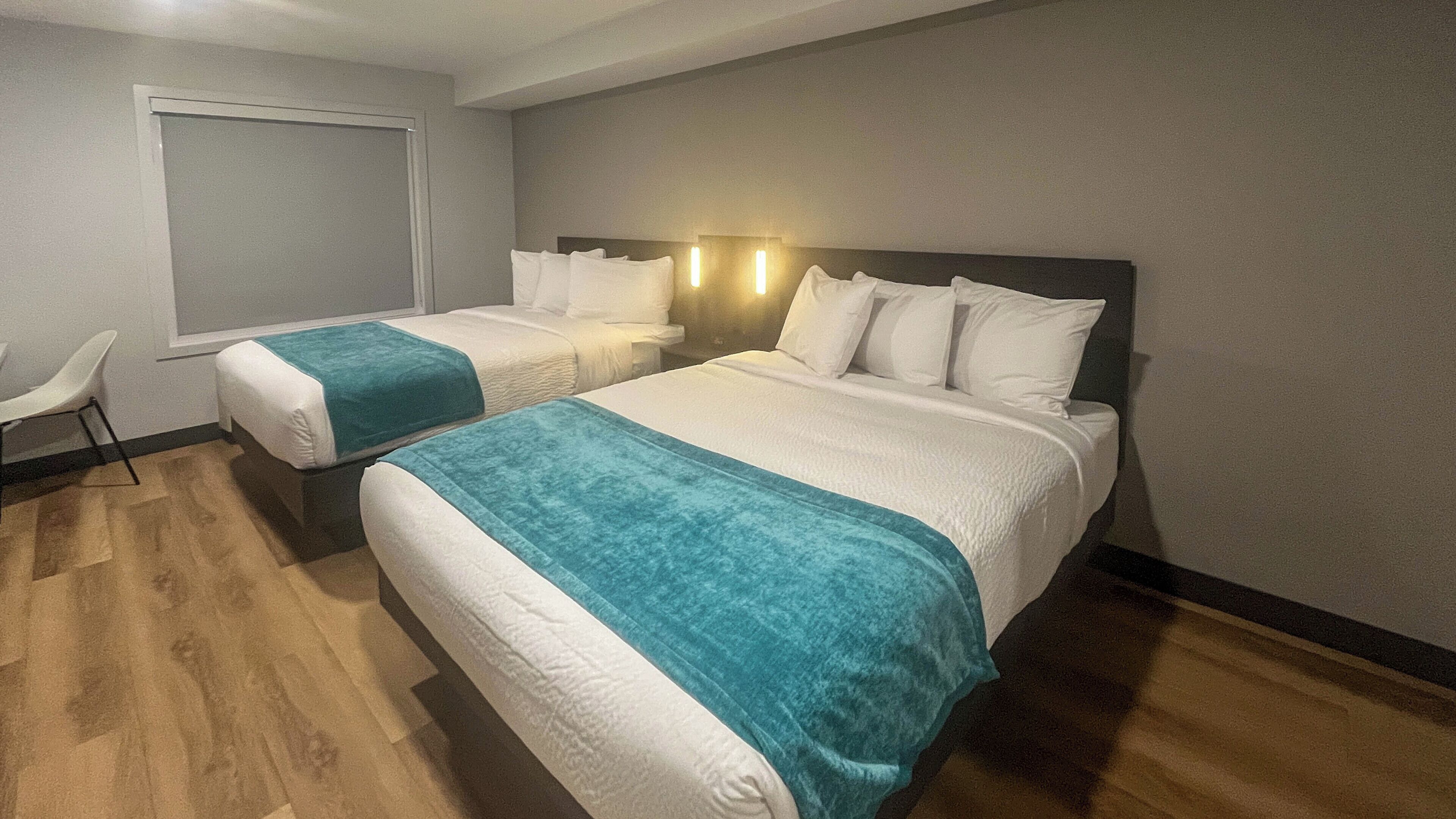 Standard Room, 2 Queen Beds, Non Smoking, Kitchen | Free WiFi, bed sheets