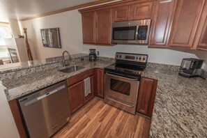 Private kitchen - Cozy 1-bedroom condo seconds from bus line in East Vail, perfect for getaways. (Vail)