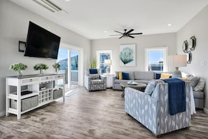 TV, books - Walkable Topsail Retreat w/ Hot Tub & Views! (North Topsail Beach)