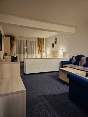 Phòng Suite dành cho gia đình, quang cảnh vườn | Khu phòng khách