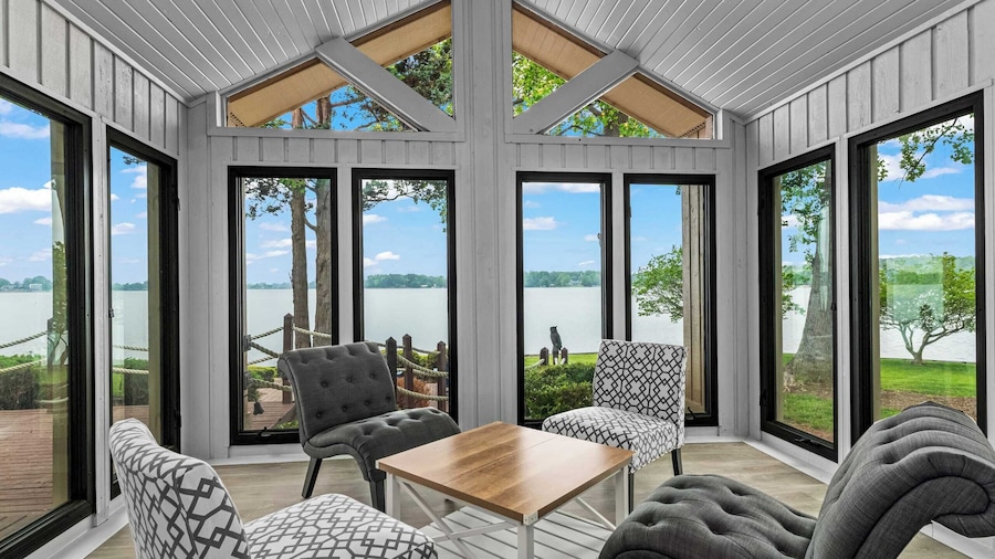 Waterfront Stay w/ Canoes, Deck, Game Room & Lake Views Near Mooresville Renwick Cove by Avantstay