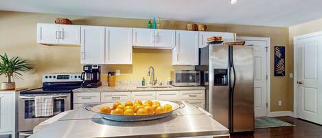 Fridge, microwave, stovetop, coffee/tea maker