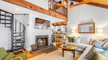 TV connectée, cheminée, jeux vidéo, livres