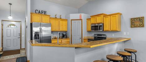 Refrigerador, microondas, horno y parrilla de estufa