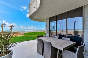 Outdoor dining - Oceanfront Escape w/ Beach Access, Pool & Balcony Sunrise Views (Daytona Beach)
