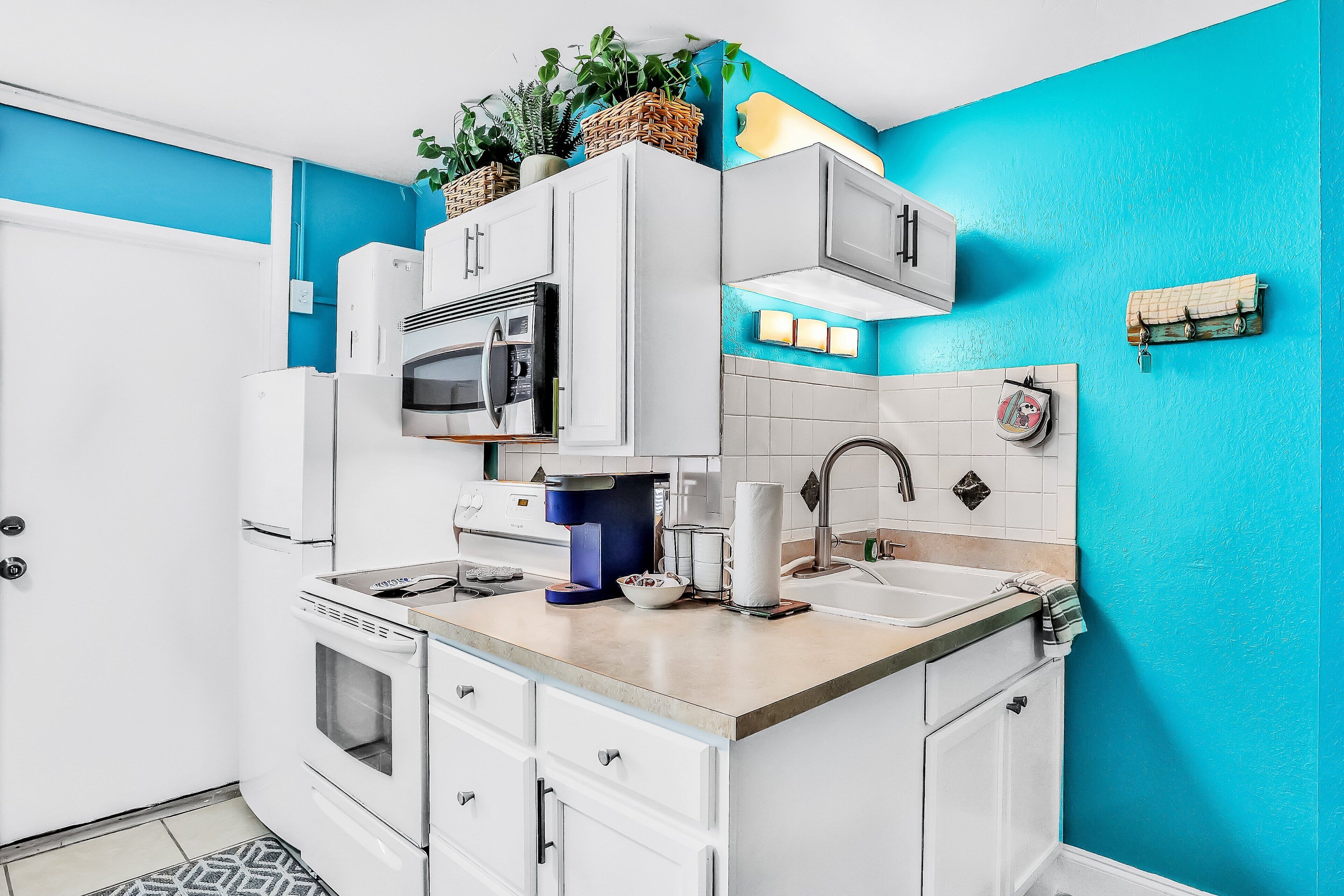 Fridge, microwave, stovetop, coffee/tea maker