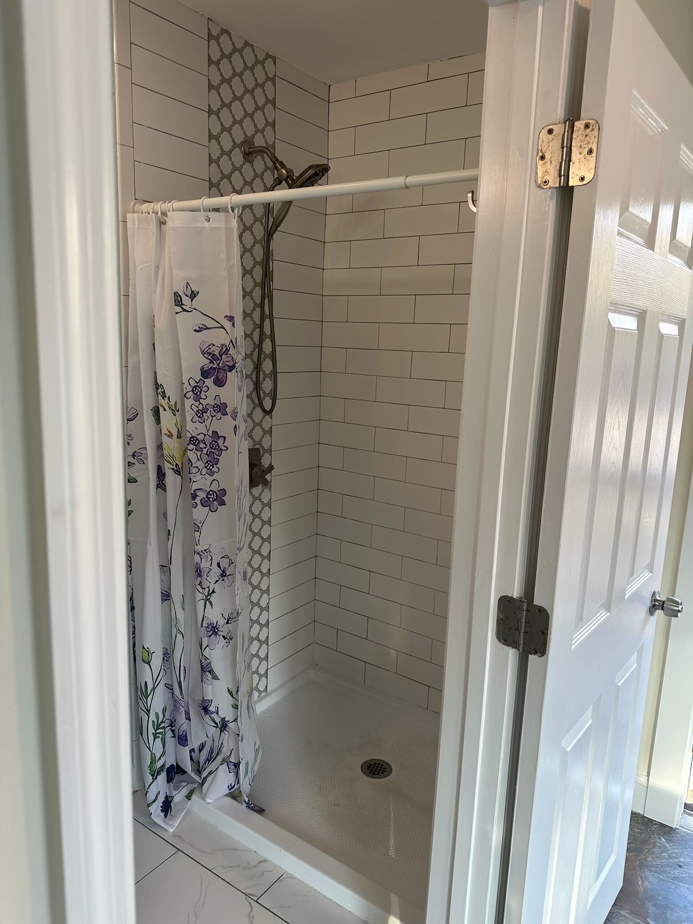 Shower, towels, soap, shampoo