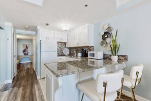 Fridge, microwave, stovetop, coffee/tea maker - Oceanfront Condo w/ Pool, Gym & Walk to Dining & Shops (Daytona Beach)
