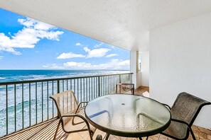 Outdoor dining - Oceanfront Condo w/ Balcony, Pool, & Beach Access – Modern Comforts (Daytona Beach Shores)