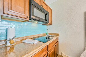 Fridge, microwave, stovetop, dishwasher - Beachfront Serenity with Balcony, Walk to Dining & Attractions (Daytona Beach Shores)