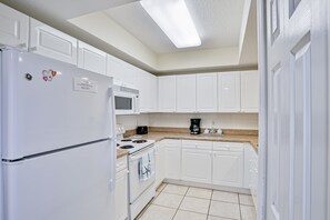 Coffee/tea maker, fridge, microwave, oven - Dog-Friendly Condo w/ Pool, Trails & Balcony Across from Beach (New Smyrna Beach)