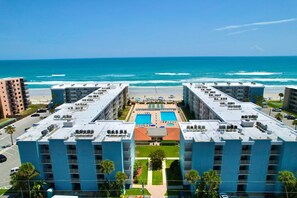 Exterior - Modern Coastal Condo w/ Balcony, Pool & Easy Walk to the Beach (New Smyrna Beach)