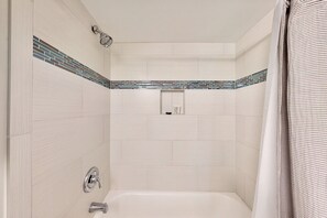 Shower, hair dryer, towels - Modern Coastal Condo w/ Balcony, Pool & Easy Walk to the Beach (New Smyrna Beach)