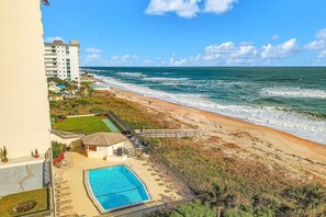 A beachfront hotel with a swimming pool, beach access, and ocean views. - Oceanfront escape w/ 2 balconies & pool access – peaceful beach vibes (Ormond Beach)