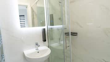 Shower, free toiletries, hair dryer, towels