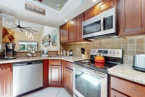 Fridge, microwave, oven, stovetop - Modern Retreat with Pool, Tennis & Patio Comfort Near Daytona Beach (Port Orange)