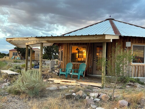 Hogan and bunkhouse on 10 acres with privacy and beautiful mountain views.