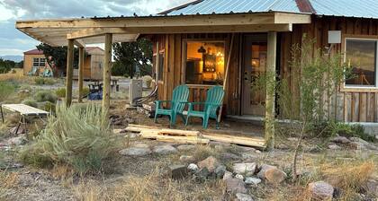 Hogan and bunkhouse on 10 acres with privacy and beautiful mountain views.