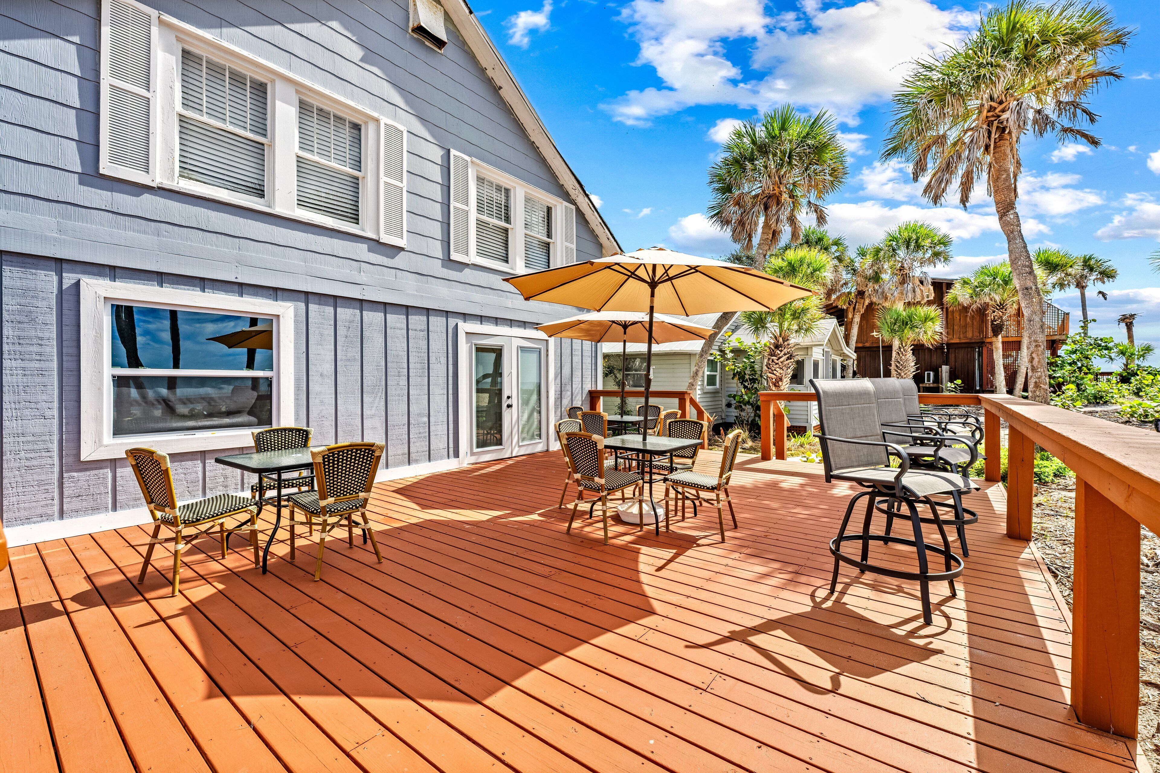 Settle into the chairs while watching the waves sparkle under a bright, sunny sky.