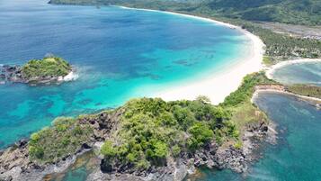 On the beach, white sand, beach shuttle, sun-loungers